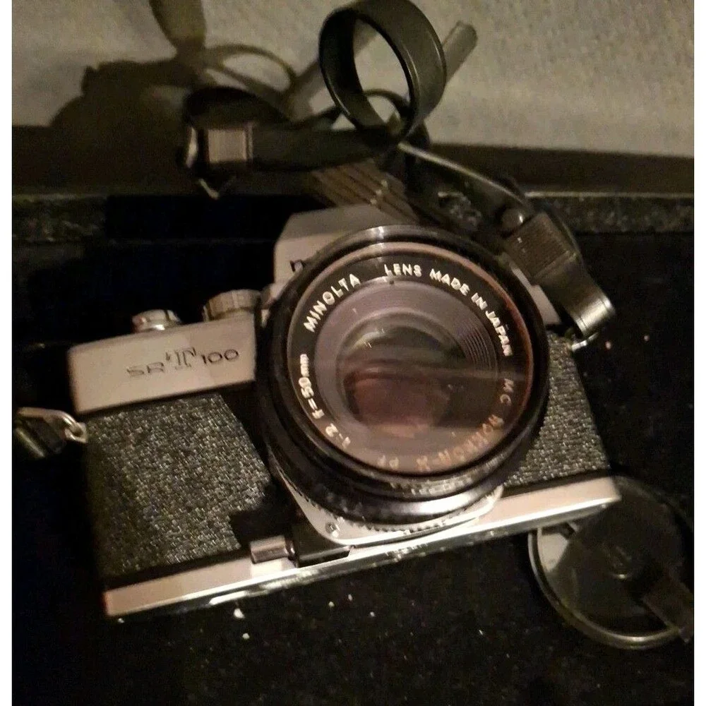 Classic Minolta SRT 100 35mm SLR Film Camera With MD 50mm F2 Lens